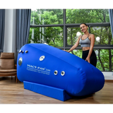 Macy-Pan ST2200 Hyperbaric Oxygen Therapy Chamber in a bright room, designed for seated use, promoting recovery and wellness.