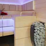 Harvia Spirit sauna heater in a sauna with purple accent lighting