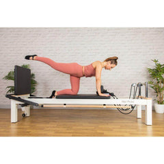 Align Pilates C8-S Pro white reformer in a studio setting during a session