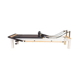 Align Pilates C8-S Pro white reformer, side profile showing the white aluminium runners and frame ends