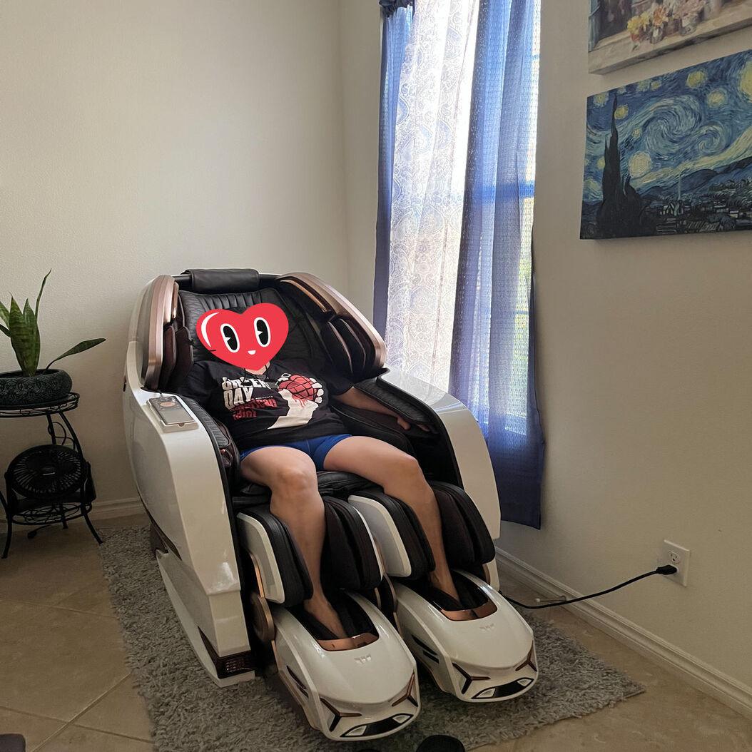 person relaxing on Bodyfriend Phantom Rovo Massage Chair