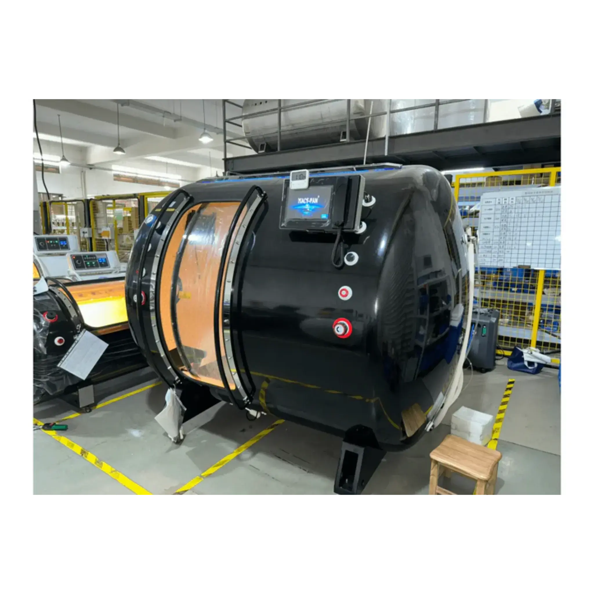 Macy-Pan HE5000 Hyperbaric Oxygen Therapy Chamber for 5 people, showcasing large sliding doors and high-tech design.