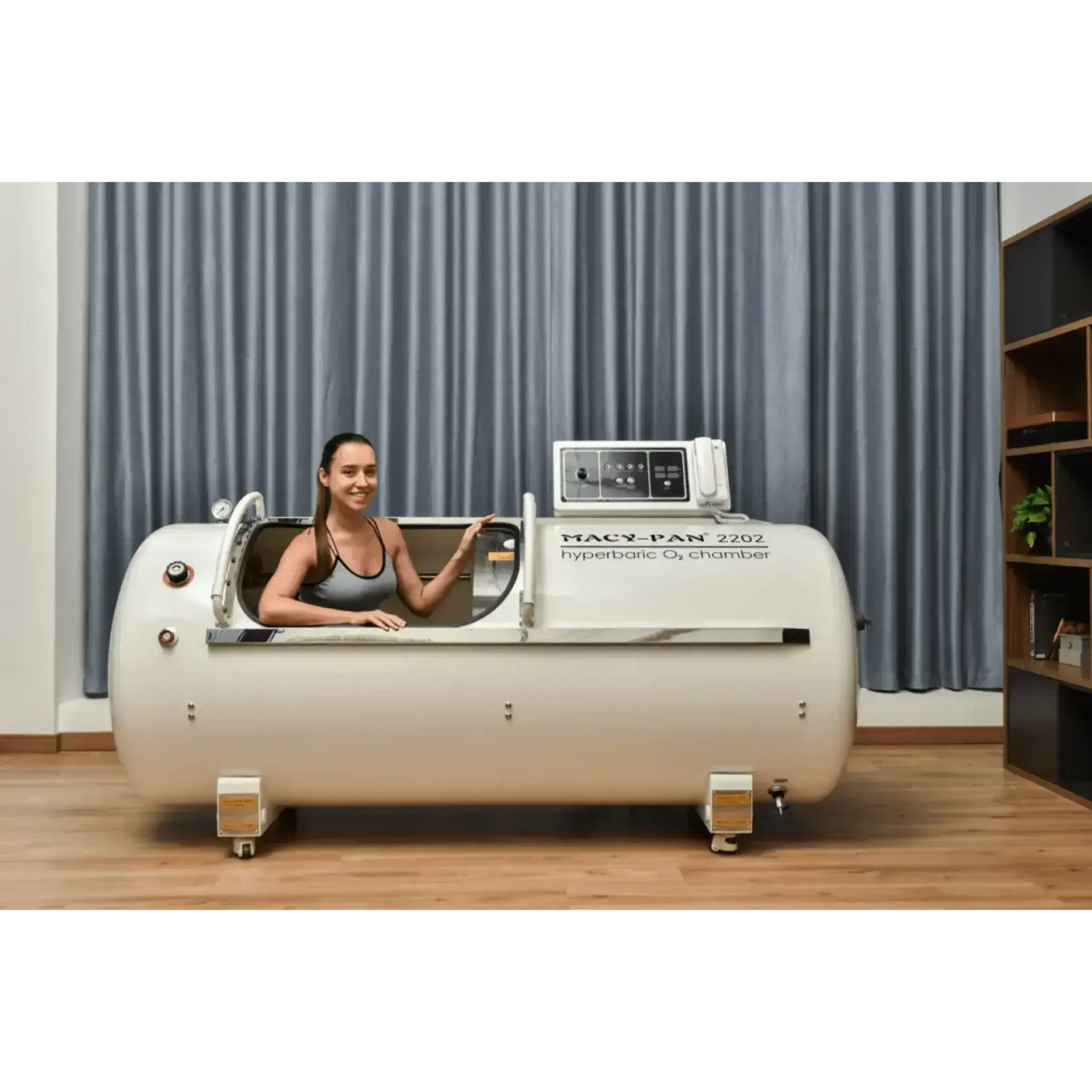 Macy-Pan HP2202 hyperbaric oxygen chamber with user showcasing its therapeutic benefits for athletes.