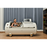 Macy-Pan HP2202 hyperbaric oxygen chamber with user showcasing its therapeutic benefits for athletes.