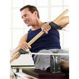 Male exerciser using Merrithew SPX Max Plus Reformer bundle