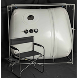 Newtowne 54" hyperbaric chamber with a chair for comfort, designed for therapeutic healing in a spacious, FDA-cleared tent.