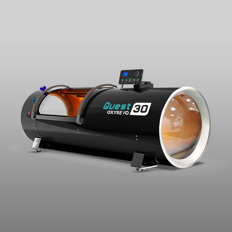 OxyRevo Quest30 hard hyperbaric chamber side angle showing stainless steel body