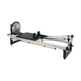 Image of Align Pilates A8 Pro Reformer, a professional-grade Pilates machine with sleek design with bosu ball
