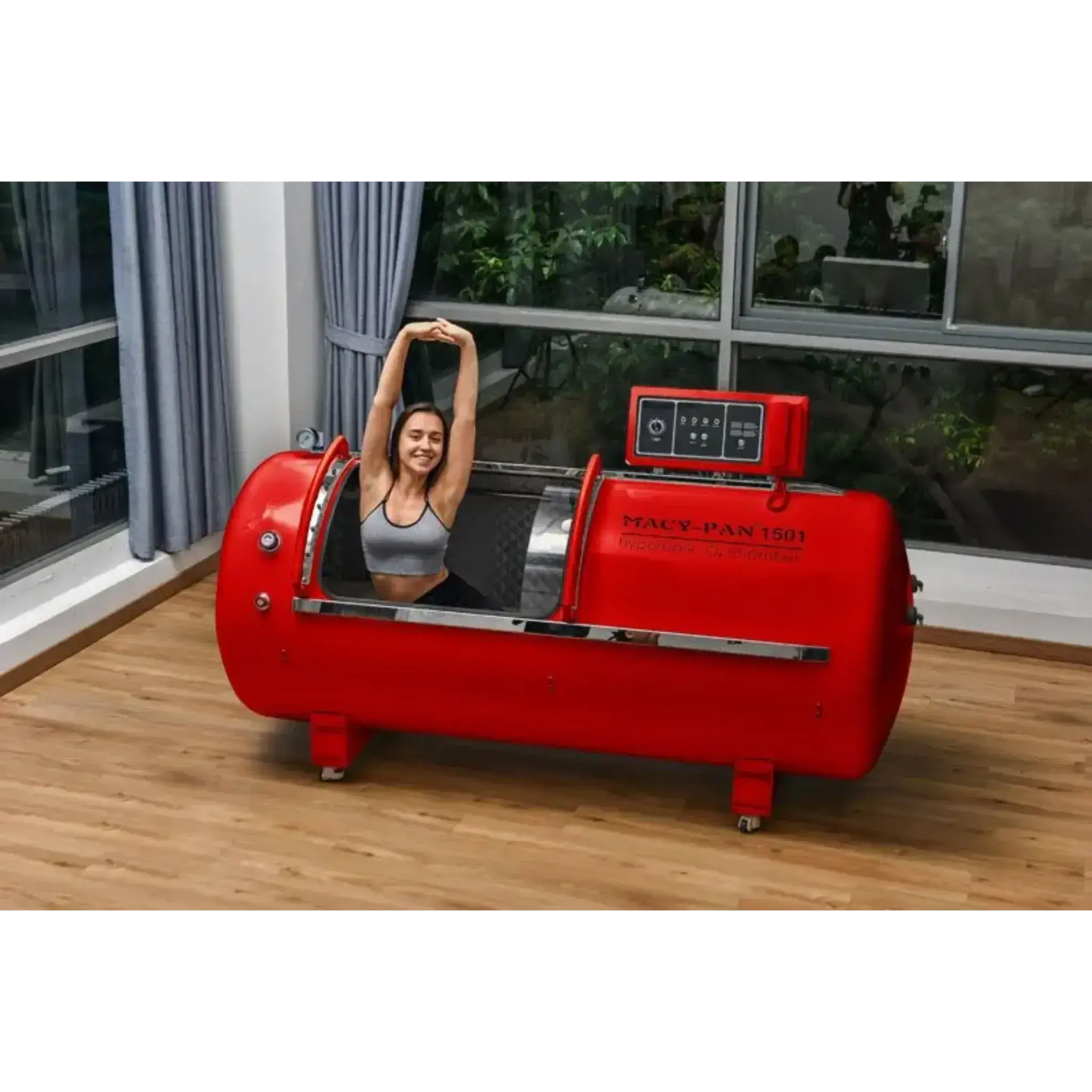 Woman enjoying therapy inside a Macy-Pan 1501 hard shell hyperbaric chamber for enhanced recovery.