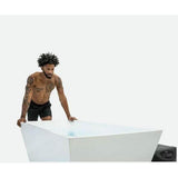 athleteic man standing near Cold Plunge Pro XL