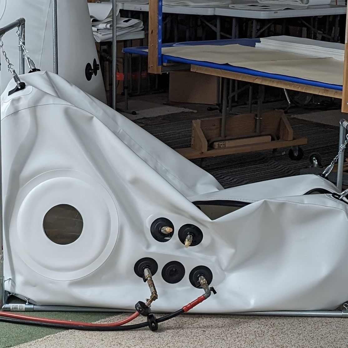 deflated newtowne hyperbarics long shoe sit down portable hyperbaric chamber