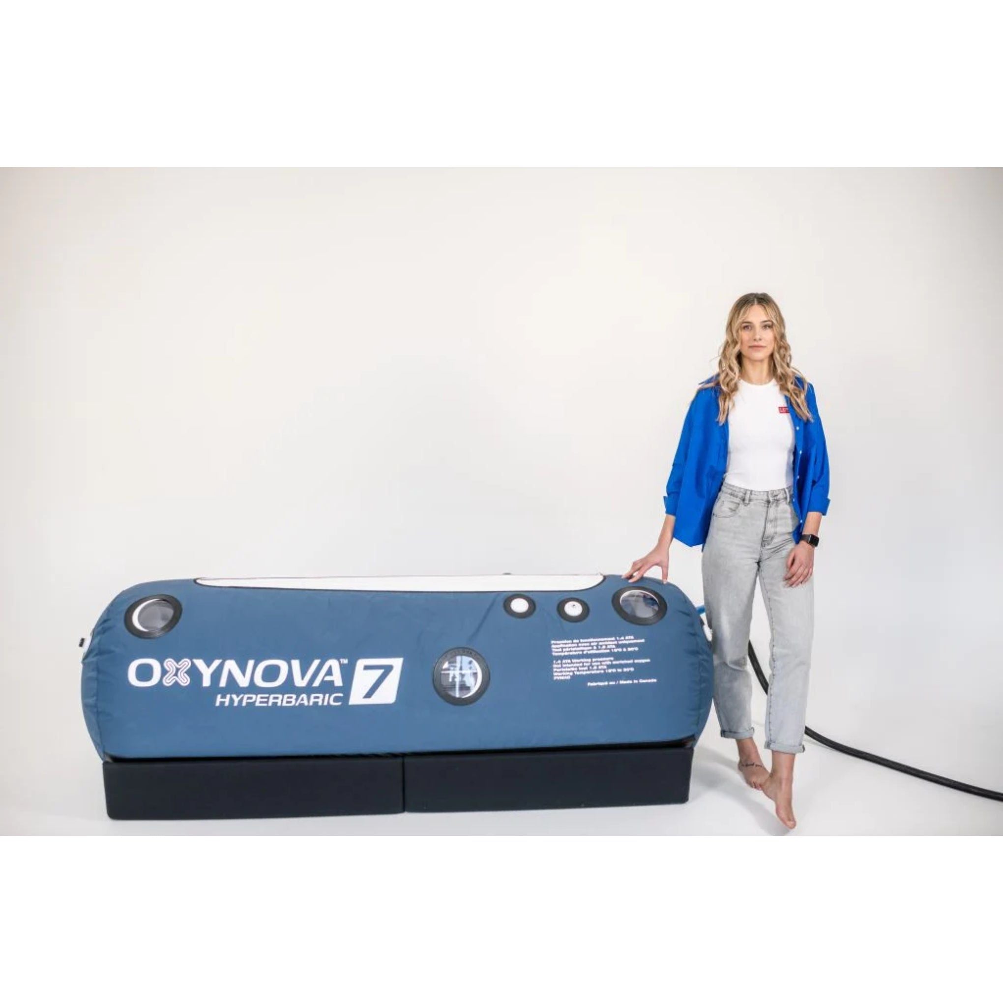female model in front of oxynova 7 soft shell hbot