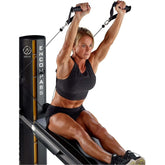 female model on Total Gym ELEVATE Encompass™ Pilates Package