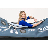 female model opening the oxynova 7 soft‑shell hbot