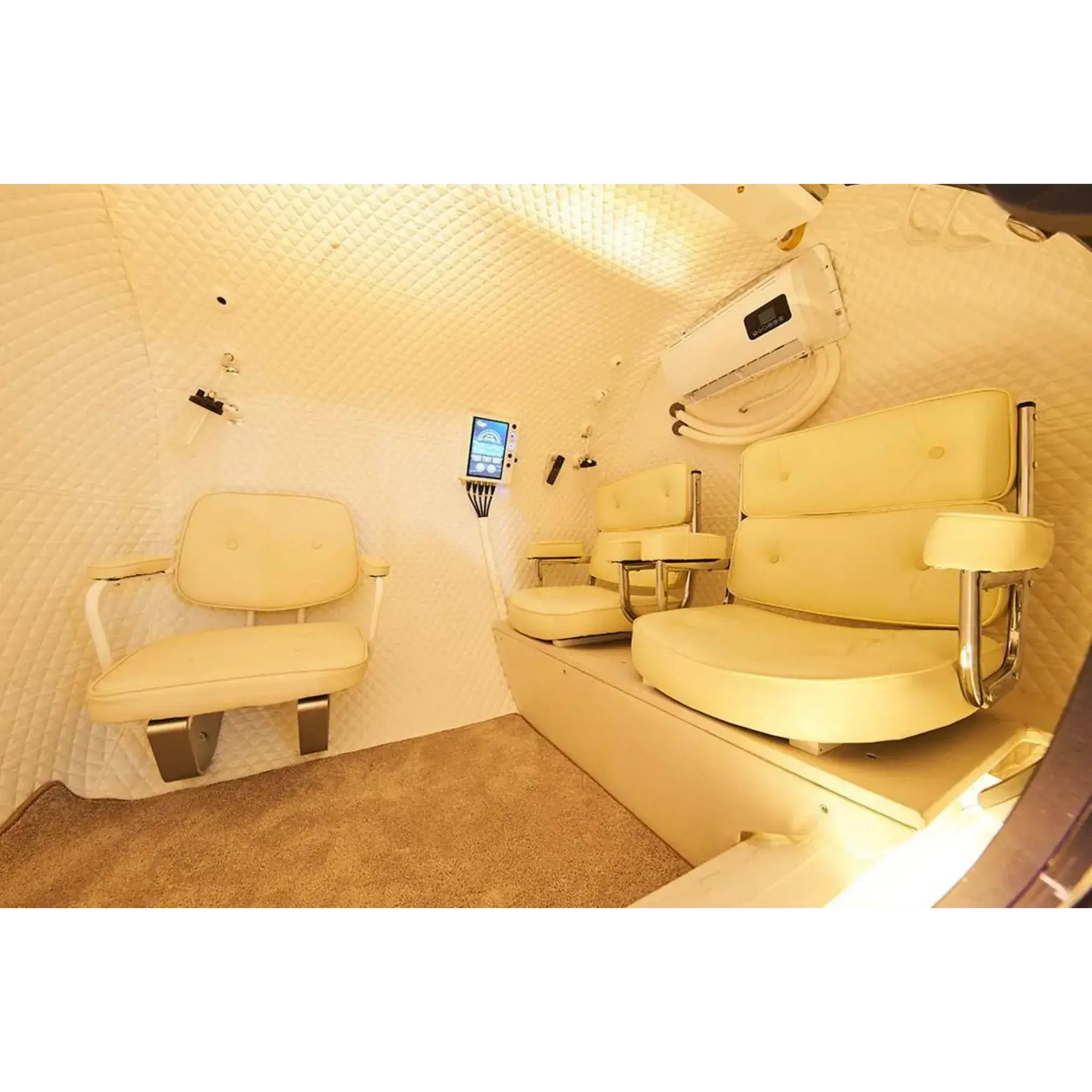 Interior of Macy-Pan HE5000 Hyperbaric Oxygen Therapy Chamber with seating for 5 people.