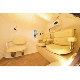 Interior of Macy-Pan HE5000 Hyperbaric Oxygen Therapy Chamber with seating for 5 people.