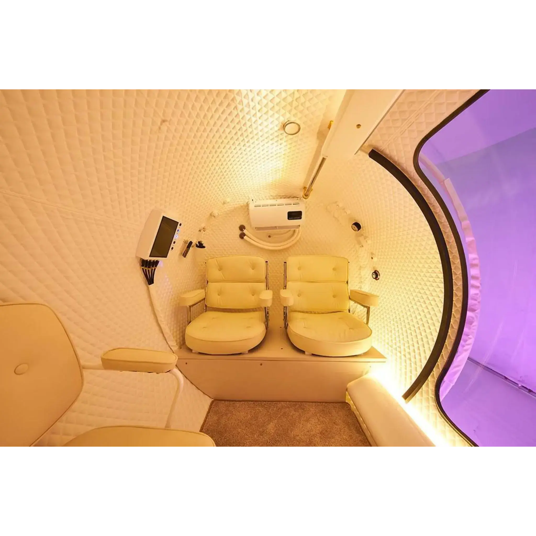 Interior view of Macy-Pan HE5000 Hyperbaric Oxygen Therapy Chamber for group therapy seating five people.