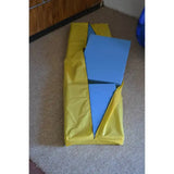 Newtowne Hyperbarics C4-40 hyperbaric chamber components with a yellow cover and blue foam pieces.