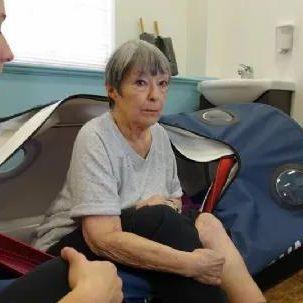 Senior client using oxynova 7 hyperbaric chamber during therapy session