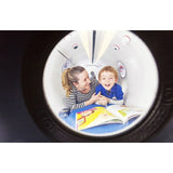 women and child inside of Oxynova 8 chamber showcasing its sitting capicity