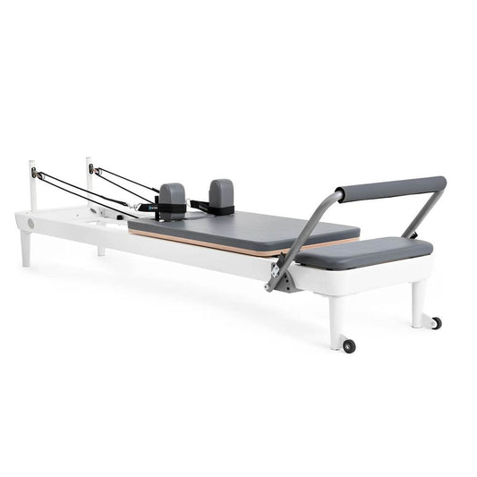Elina Pilates Nubium Reformer — vertical storage aluminum reformer that stands upright against the wall