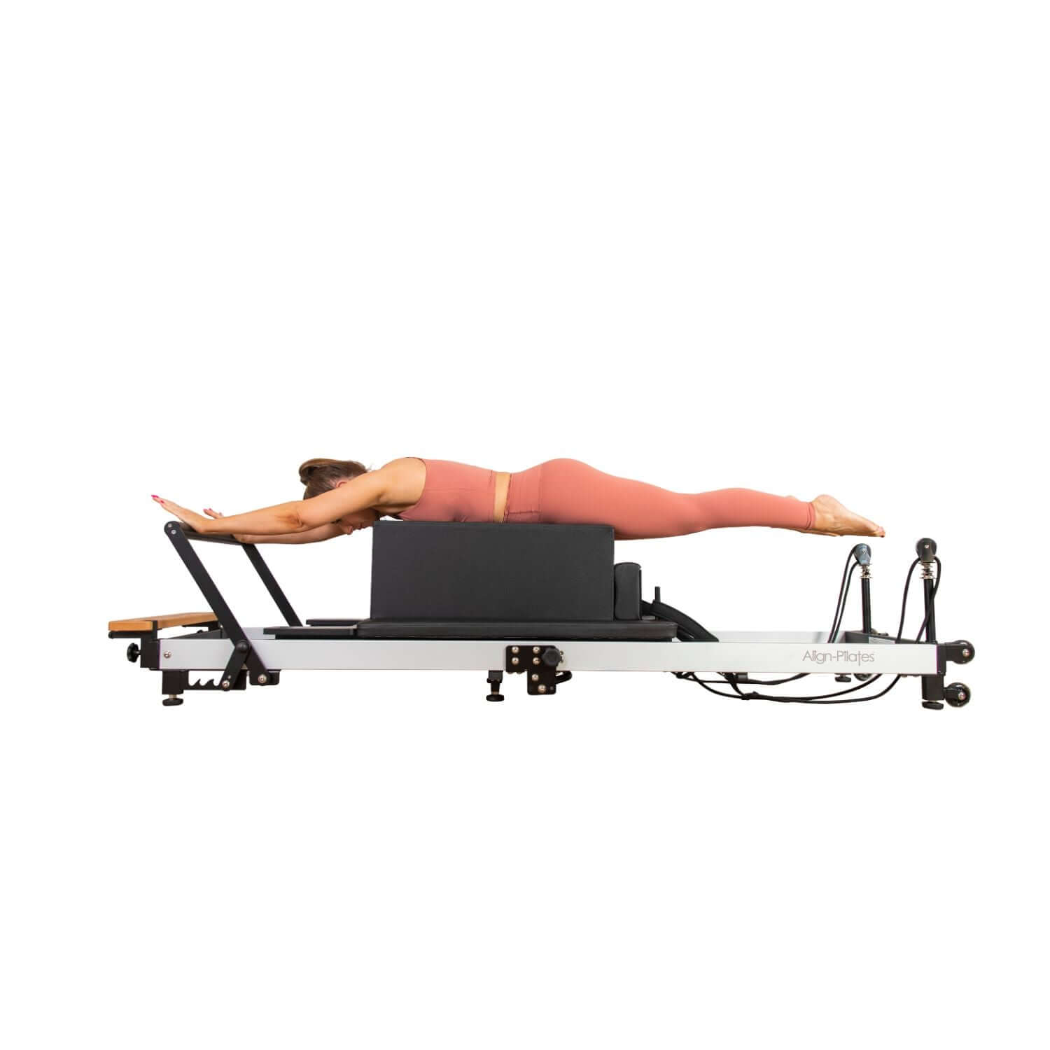 User Exercising on Align Pilates F3 Folding Home Reformer
