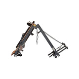 Foldable metal Pilates reformer showing adjustable components for strength and rehabilitation exercises.