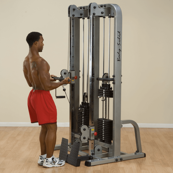 Male performing a curl exercise on the Body-Solid Pro Clubline Dual Cable Column SDC2000G black fitness equipment - RecovAthlete
