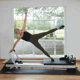 Instructor demonstrating exercise on Align Pilates C8 Pro