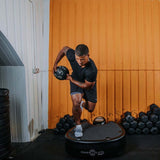 man working out on Power Plate pro5HP Full Body Vibration Platform