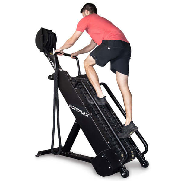 Professional male trainer showing advanced incline climbing workout"