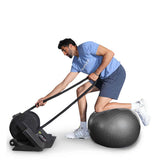 man sititng on balance ball and doing RopeFlex RX2000 Mini Rope Trainer