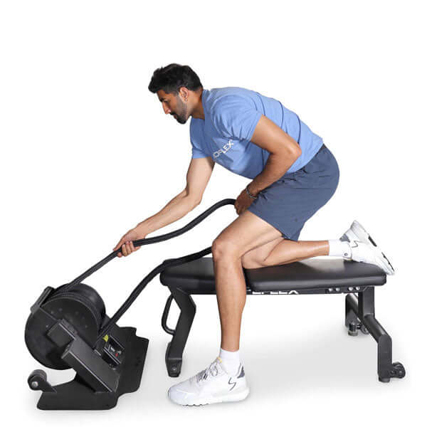 man sitting on chair and doing workout on RopeFlex RX2000 Mini Rope Trainer