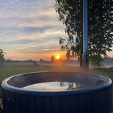 SaunaLife 6 Person Wood Fired Hot Tub Natural With Sunset View