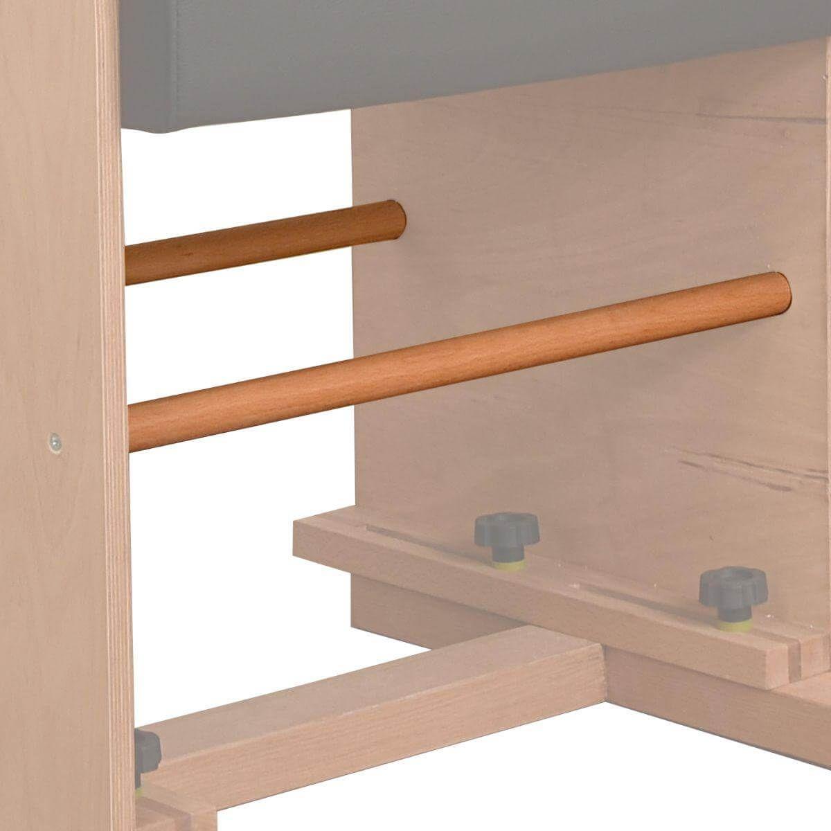 Close-up view of wooden bars on a Private Pilates Premium Ladder Barrel for enhanced stability and support.
