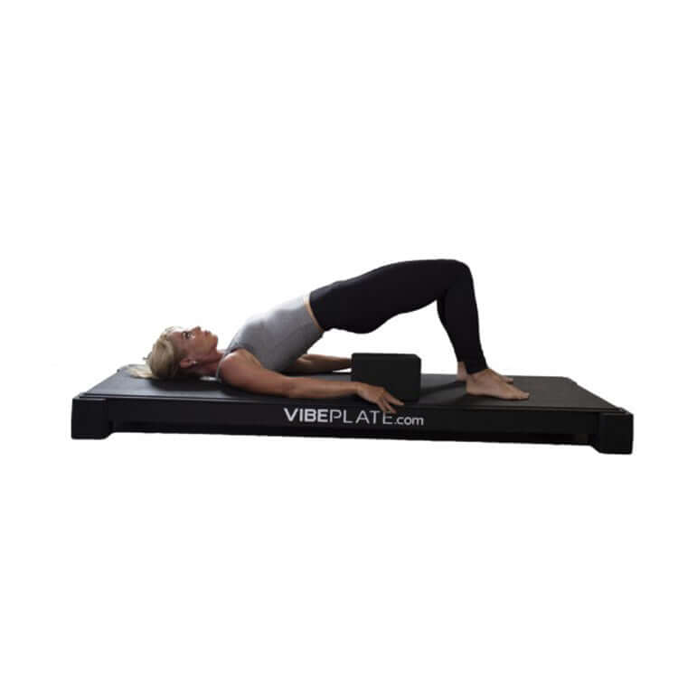women doing yoga asanas on vibeplate yogaplate