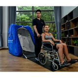 Macy-Pan MC4000 hyperbaric chamber with a wheelchair user and assistant, showcasing accessibility in therapy.