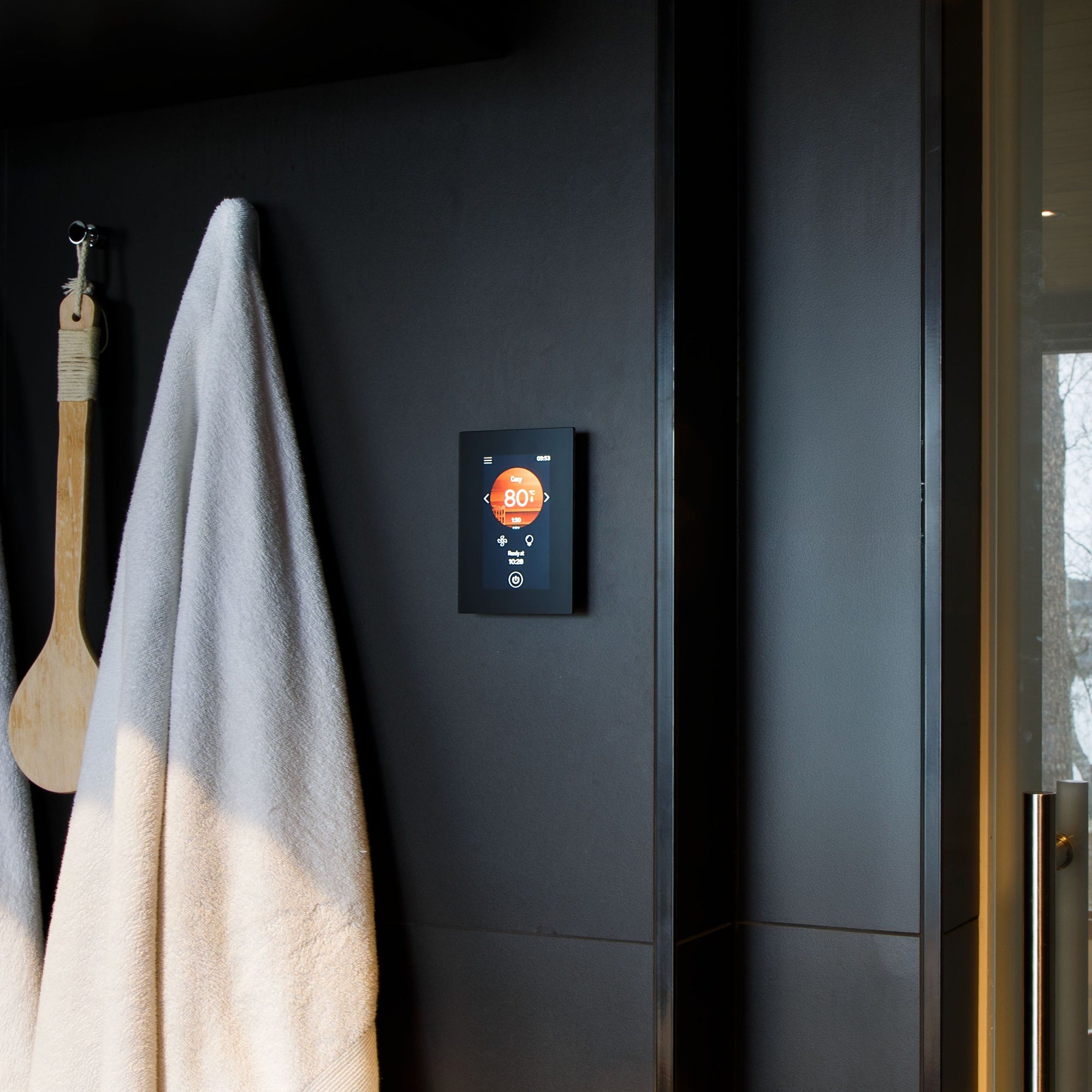 Harvia Fenix FX001XW control panel in a sauna changing room