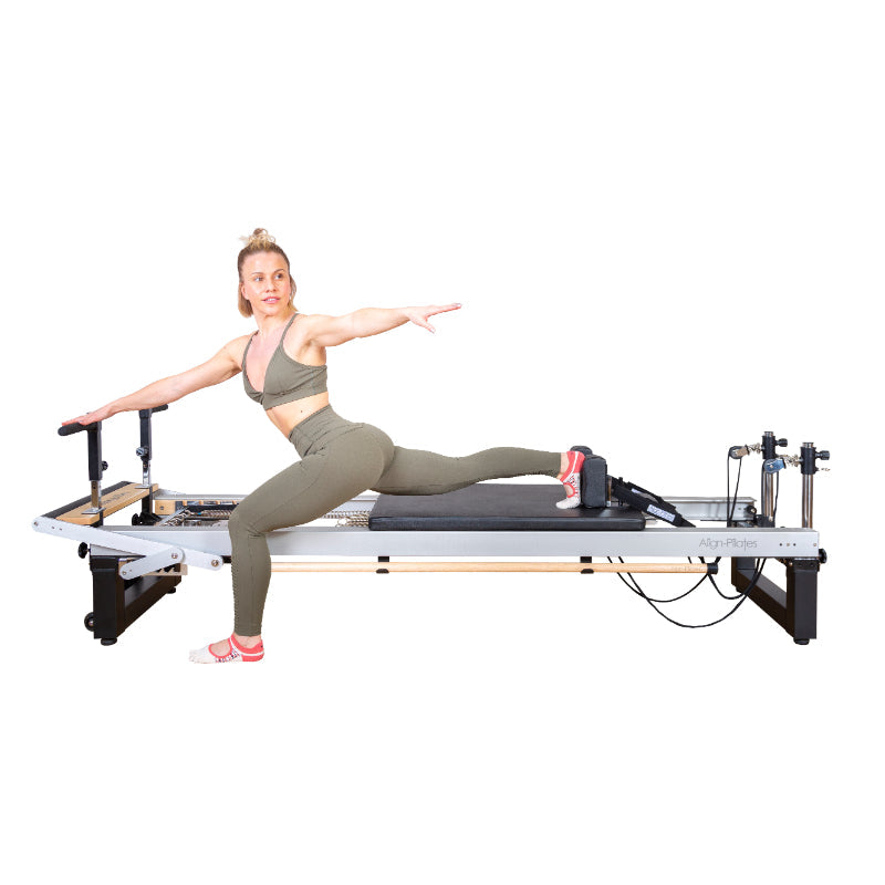 Align Pilates A8-Pro reformer side view with a client working on the carriage