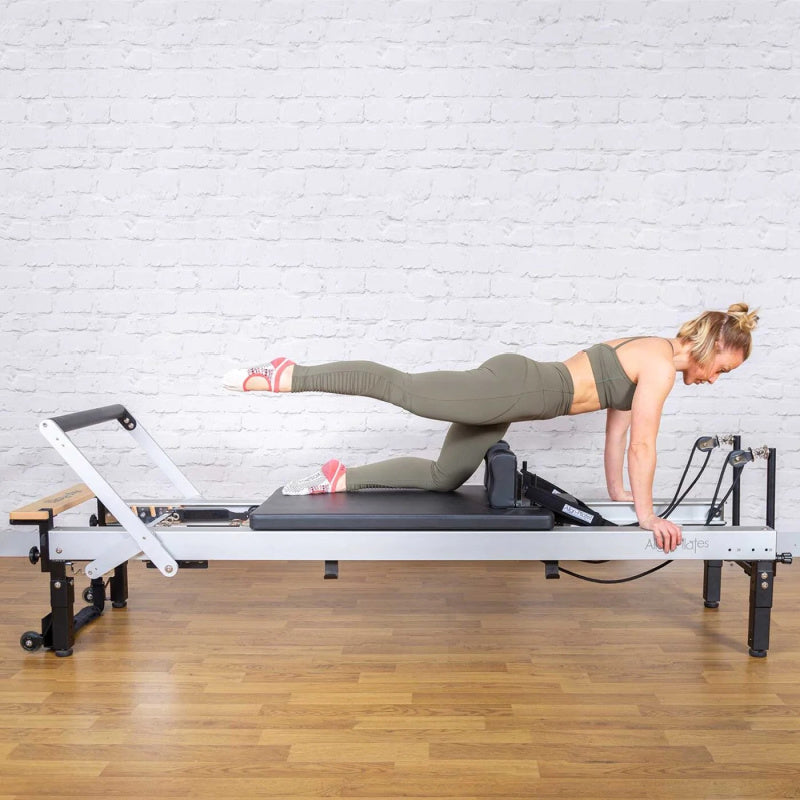 C8-Pro reformer side view with a client lying on the carriage