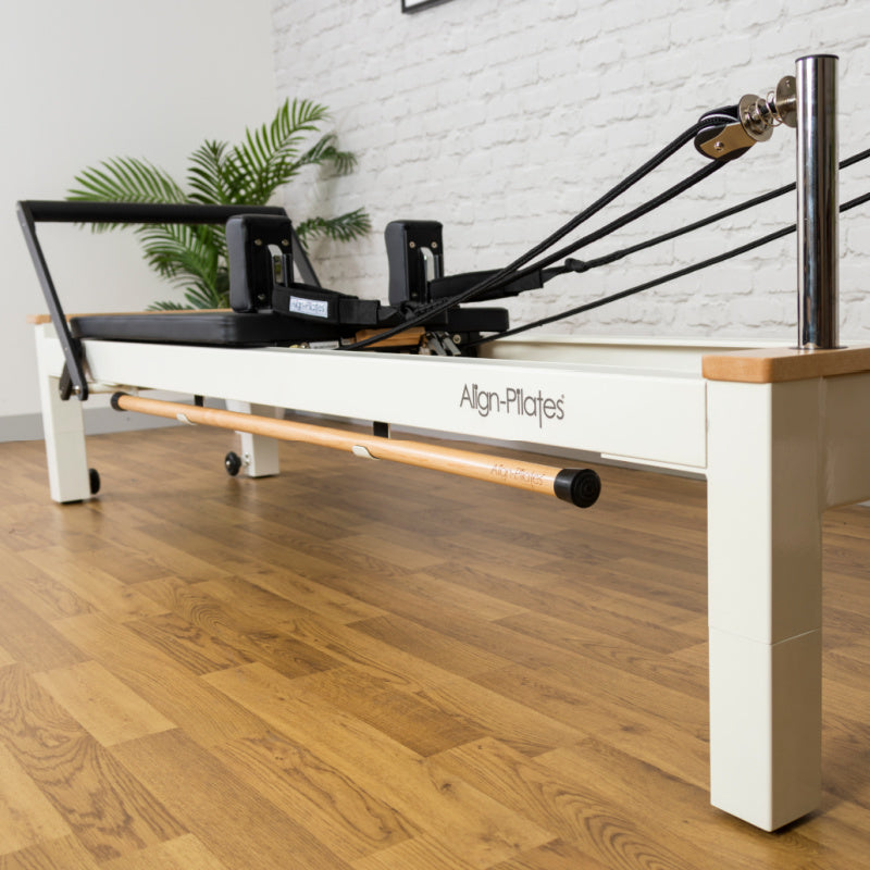 C8-S Pro reformer at a diagonal on a wood floor