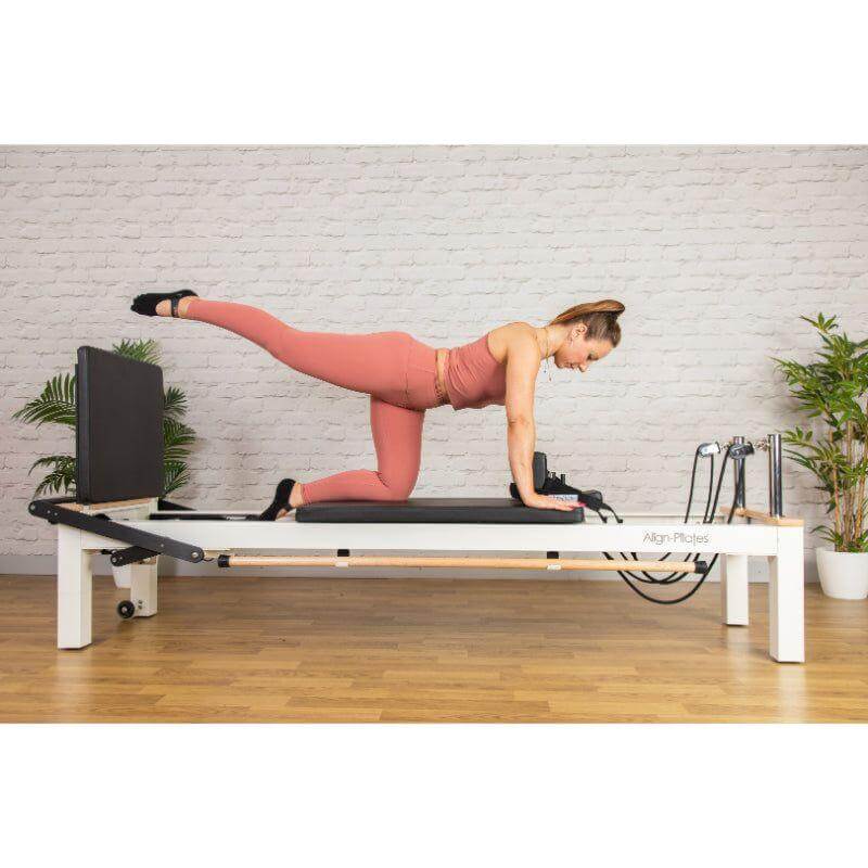 Align Pilates C8-S Pro white reformer in a studio setting during a session