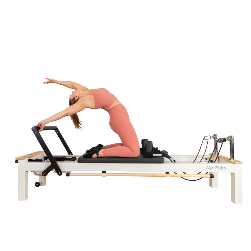 Side view of a client on the C8-S Pro carriage mid exercise