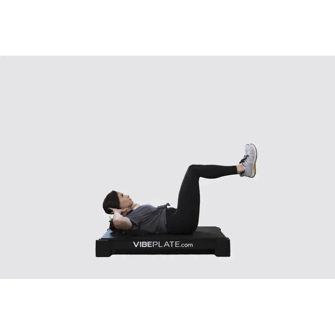Female Model streching on Vibeplate 2440 whole body vibration machines