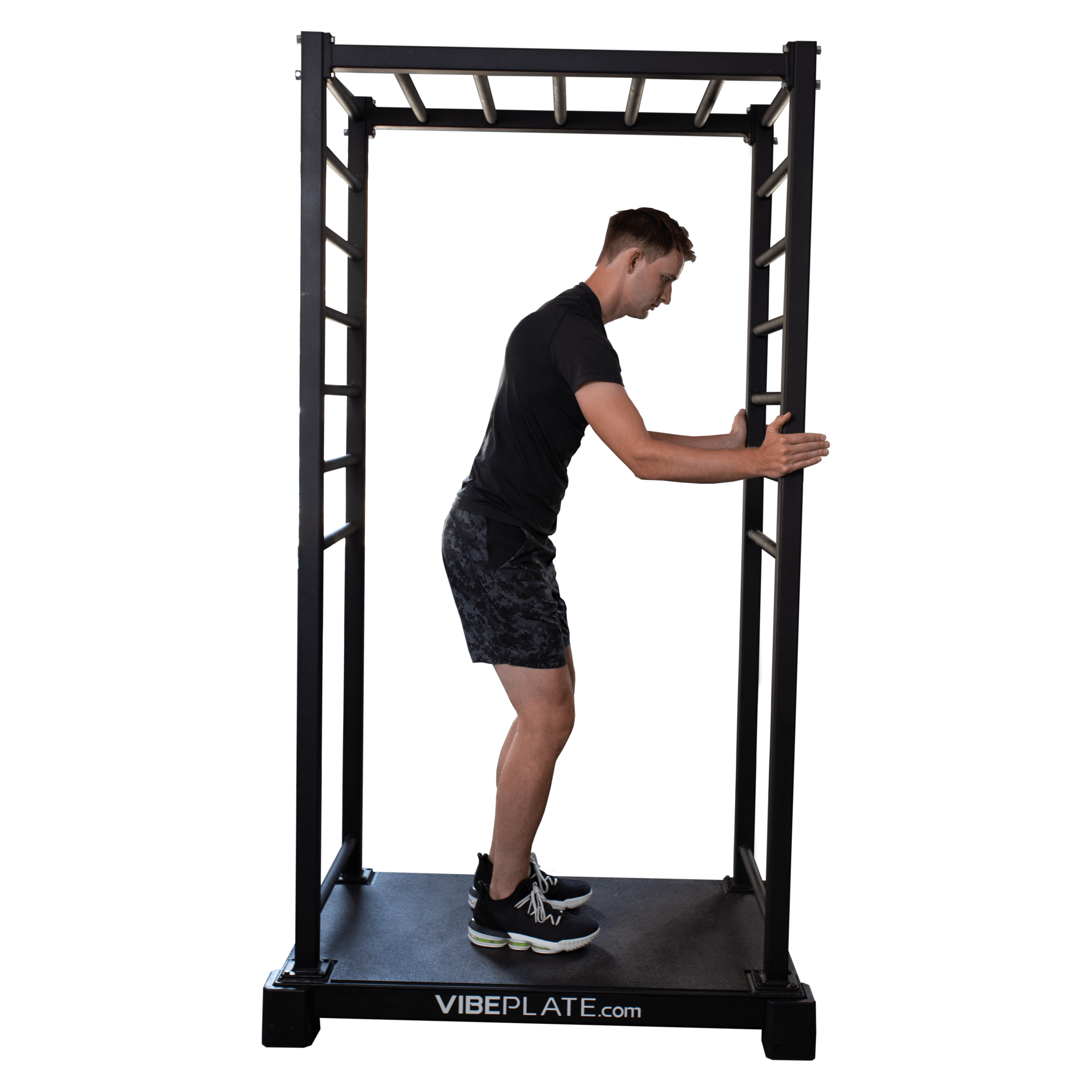 Man kneeling on VibePlate VibeStretch platform, performing a lower-body stretch for increased flexibility"