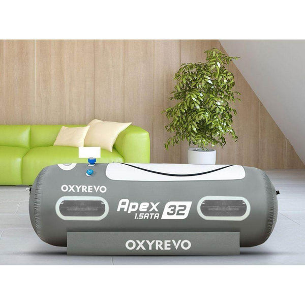 OxyRevo Apex 32 soft lying hyperbaric chamber set up in a living room