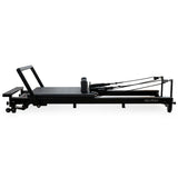 Align Pilates C8-Pro Noir reformer seen from the rope riser end, risers and ropes in view