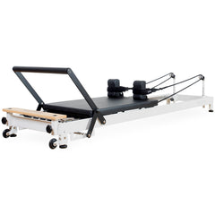 Align Pilates R8-Pro Pilates reformer in white, full length side view