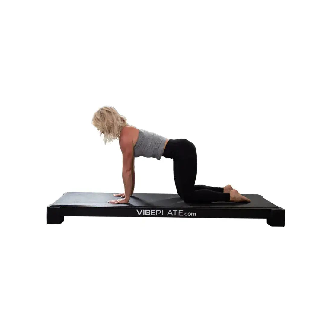 women doing yoga on vibeplate yogaplate