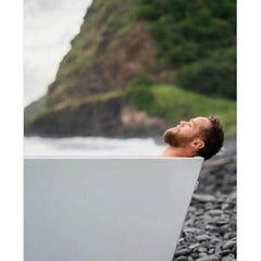 Peaceful moment captured of a man resting in the Cold Plunge I Pro by Luxury Spas